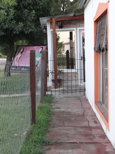 Peluqueria Estilo's Unisex